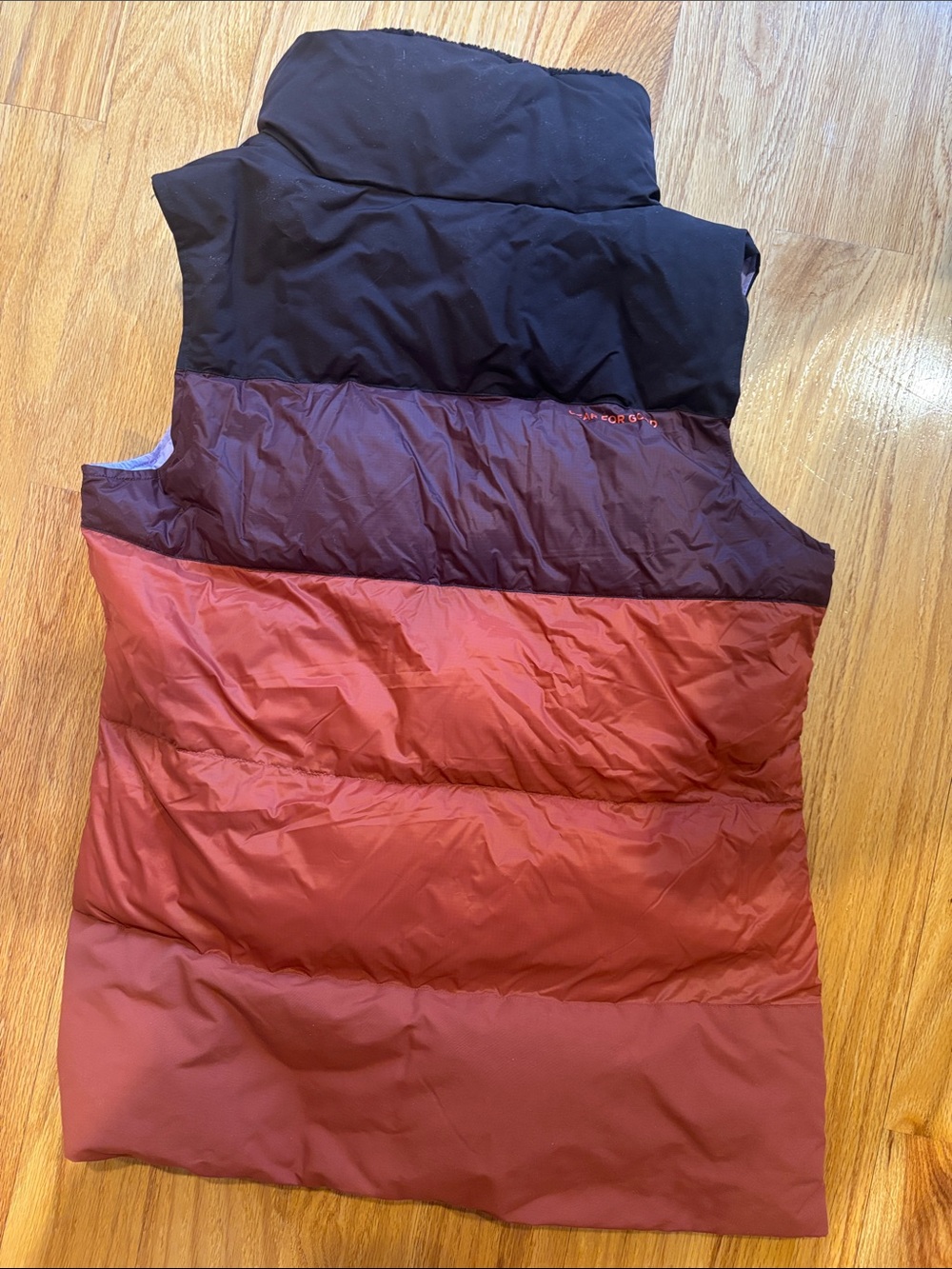 cotopaxi Colorblocked Quilted Puffer Vest in Rust, Dark Brown & Black - Picture 4 of 5